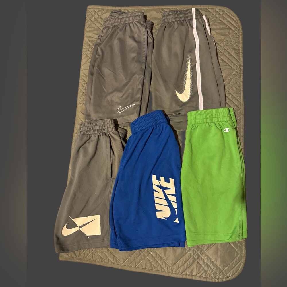 4 pair of Youth Nike Shorts Lot and 1 pair of Champion Shorts